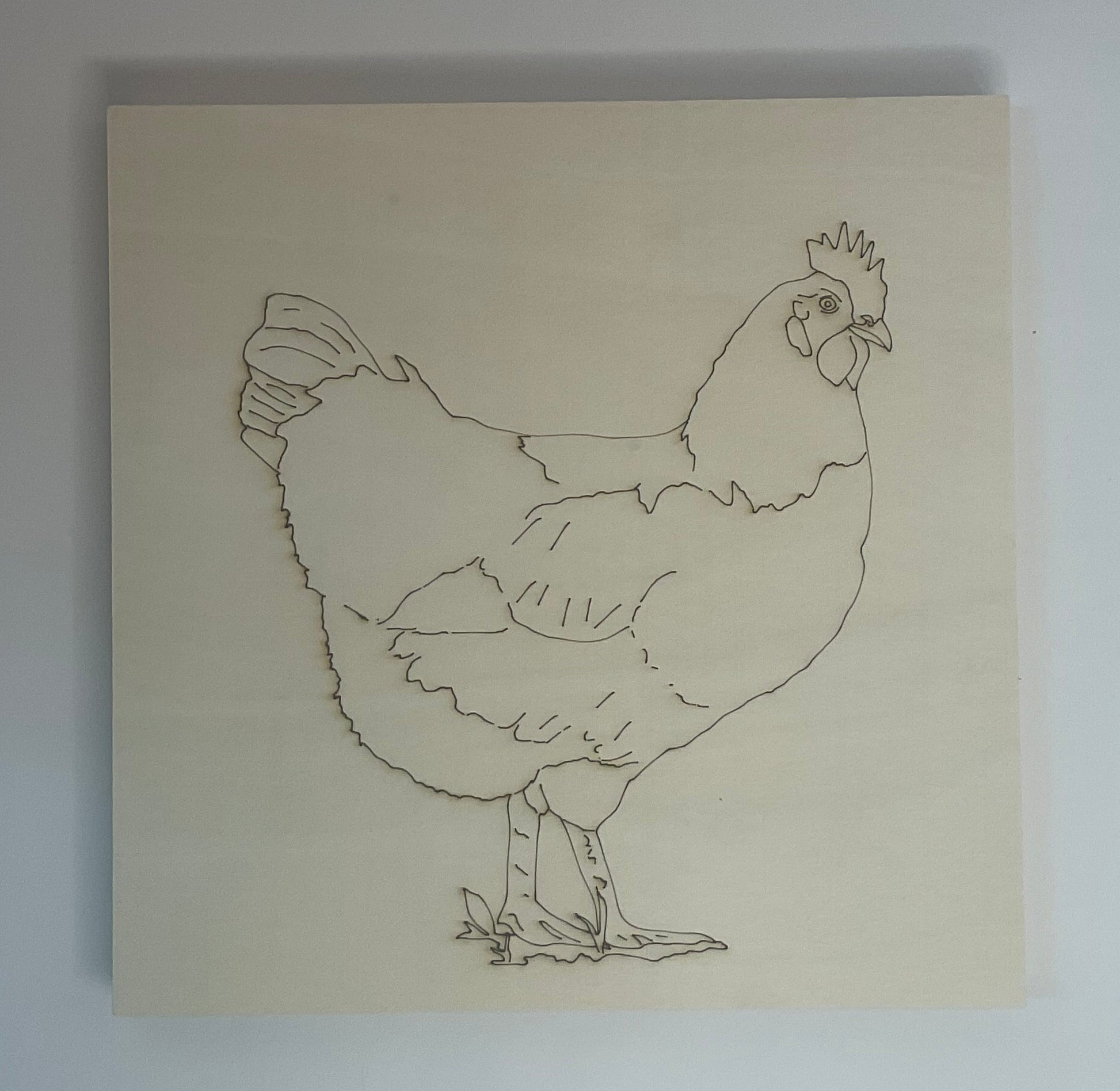 Outline drawing of a chicken on a wood substrate.